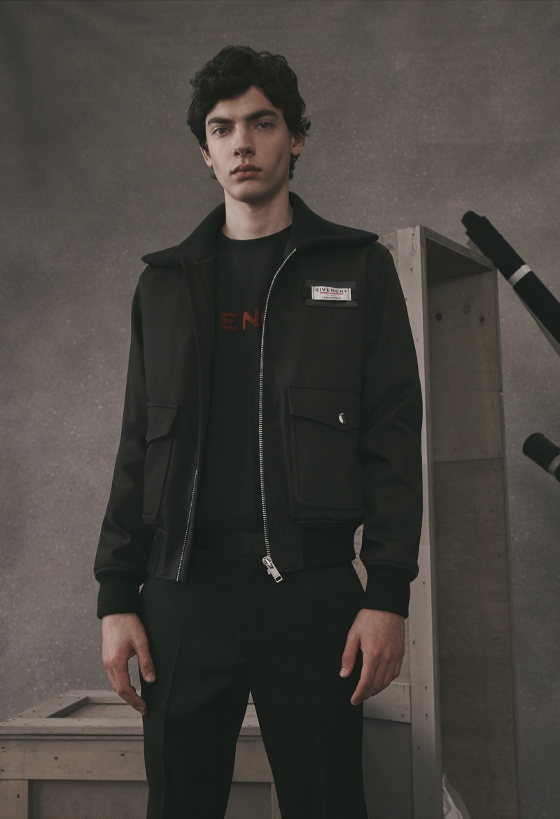 Donning a bomber jacket, Lev Uliesov wears a look from the Givenchy Atelier collection.