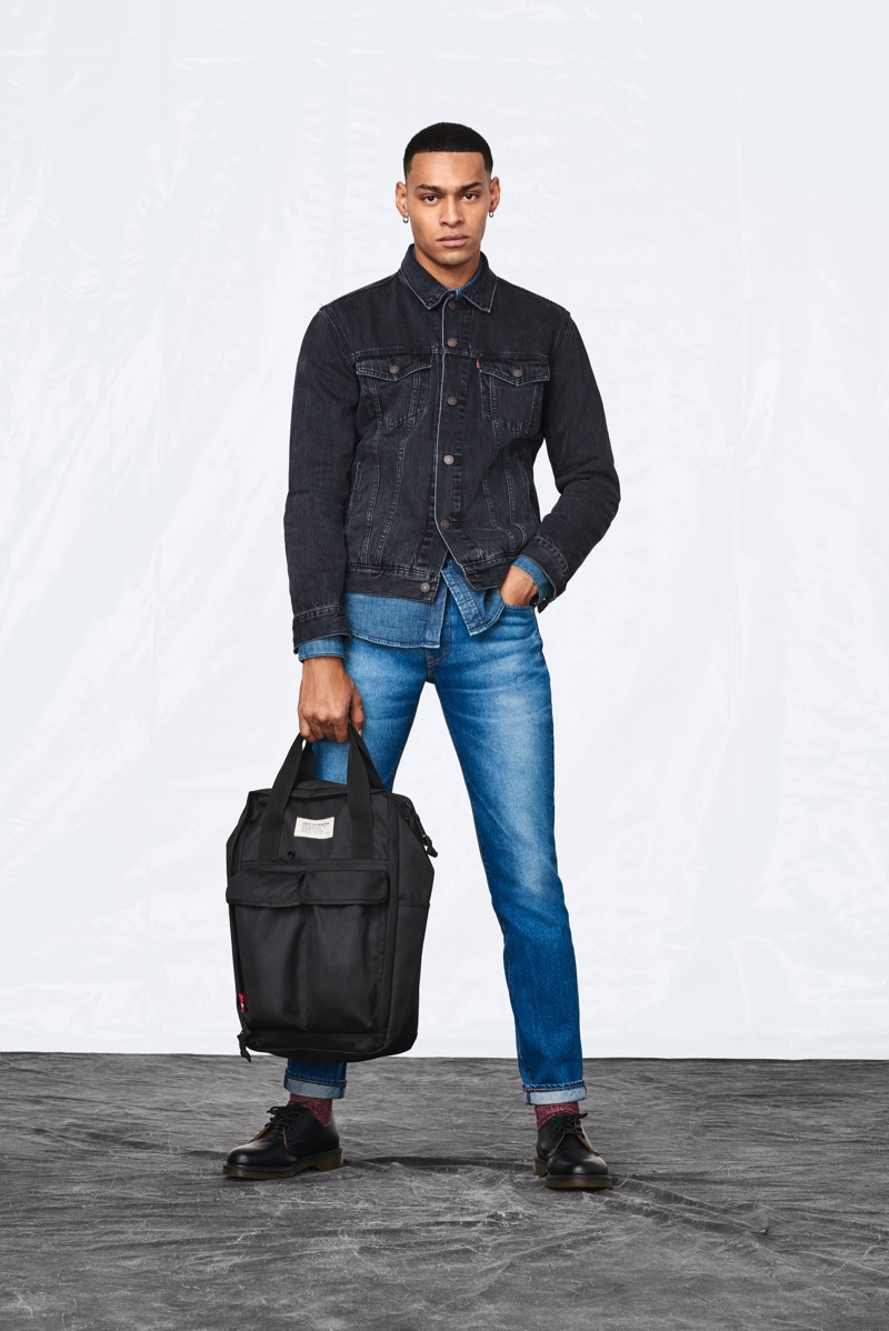 Holding one of Levi's new backpacks, Sua El Gagui doubles down on classic denim from the brand.