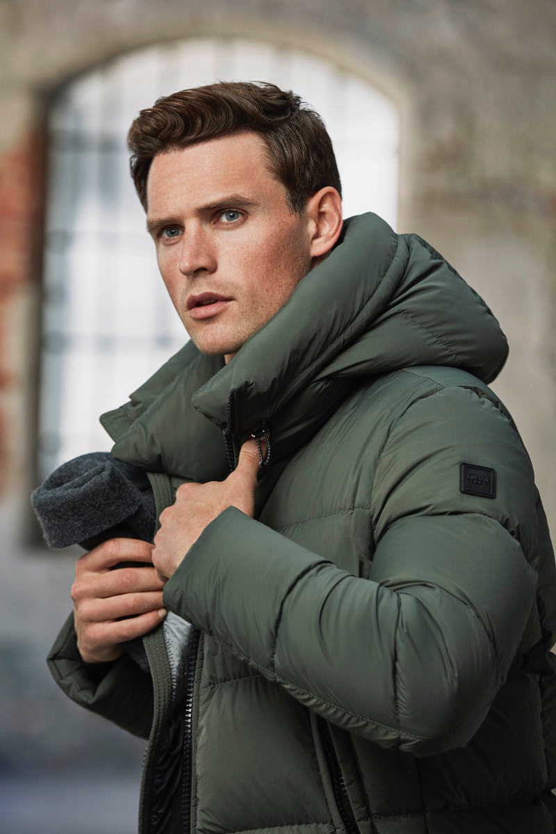 British model Guy Robinson sports a green puffer jacket from Lufian’s fall-winter 2019 collection.