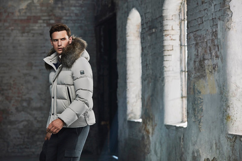 Going casual, Guy Robinson models a grey Lufian puffer jacket with cargo pants.