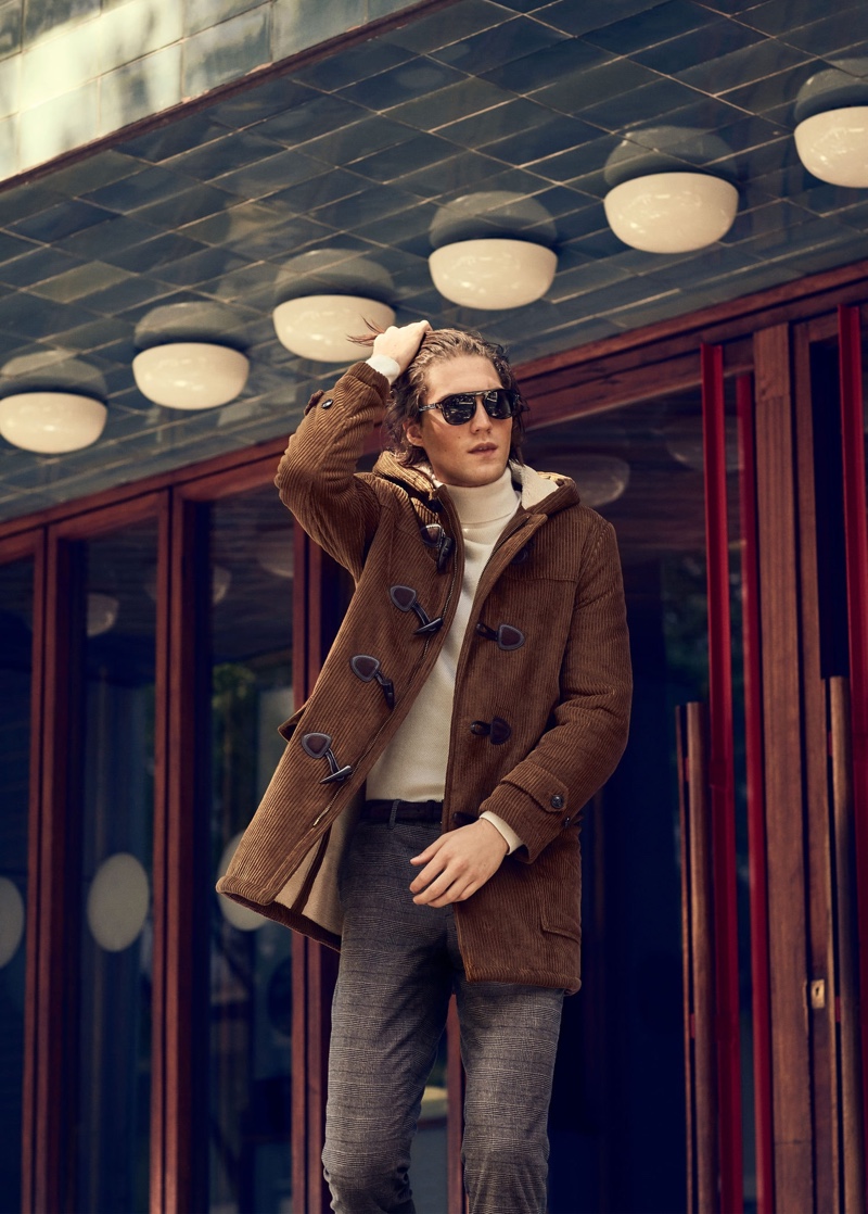 A cool vision, Boyd Gates rocks a brown corduroy dufflecoat from Mango.