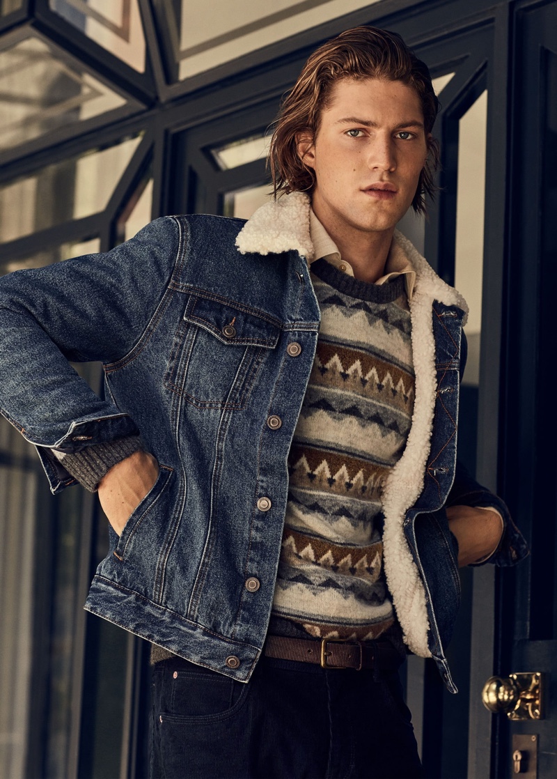 Boyd Gates sports a fairisle sweater with a denim trucker jacket from Mango.