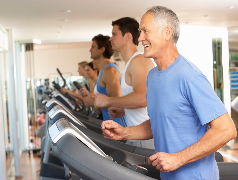 Older Man Working Out Grey Hair Smiling Treadmill