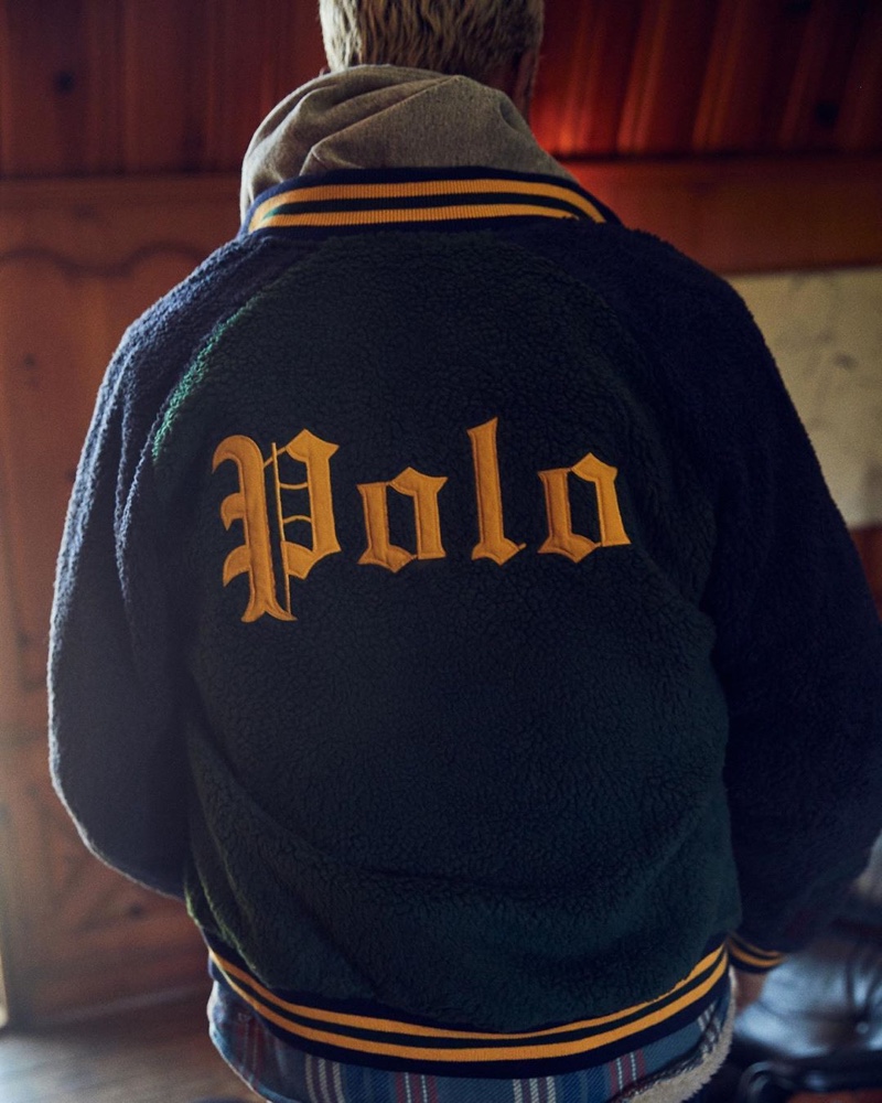 Daouda Ka shows his love for POLO Ralph Lauren with the brand's sherpa varsity jacket $298.