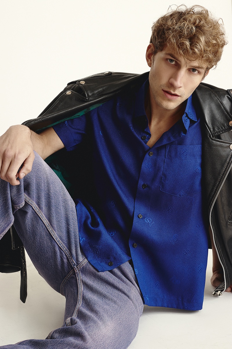 Rasmus wears vintage shirt Dior, vintage leather biker jacket Berto Lucci, and jeans Balenciaga.