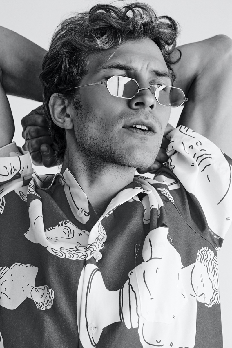 Rasmus wears sunglasses Etnia and shirt Band of Outsiders.