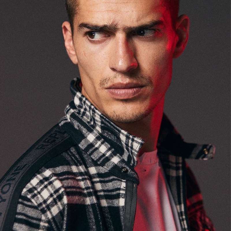 Front and center, Marco Vinante appears in Replay's fall-winter 2019 campaign.