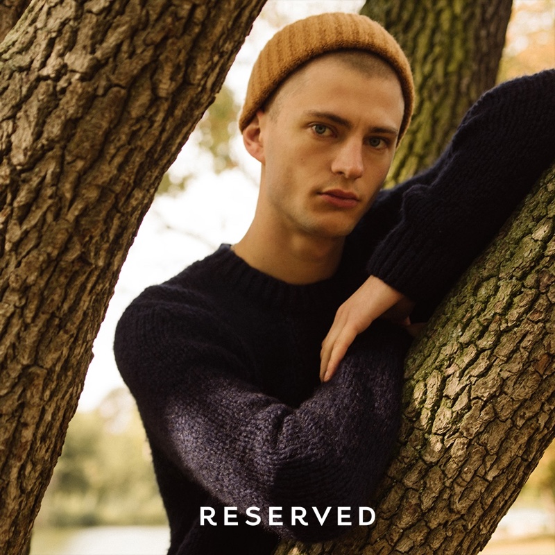 Making a case for knitwear, Lucas Berny models a beanie and sweater from Reserved's fall 2019 collection.