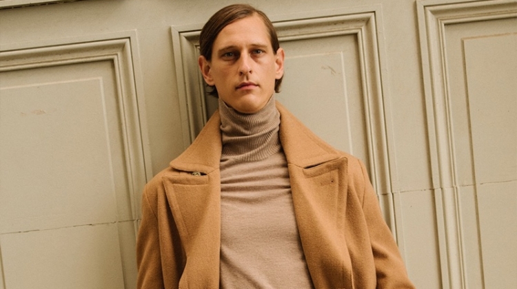 Making a case for monochromatic style, Rogier Bosschaart models a camel coat by Reserved.