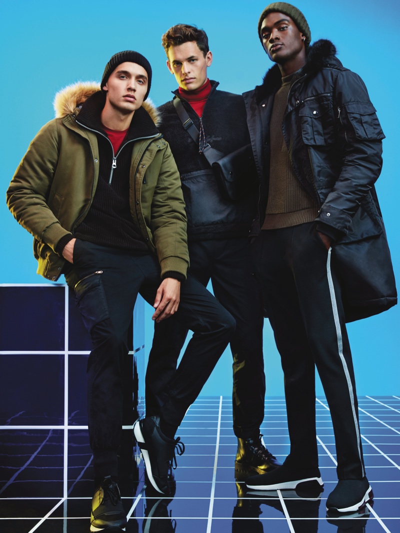 Models Dom Stowell, Maximilian Wefers, and Davidson Obennebo wear fashions from River Island's Electric Xmas collection.