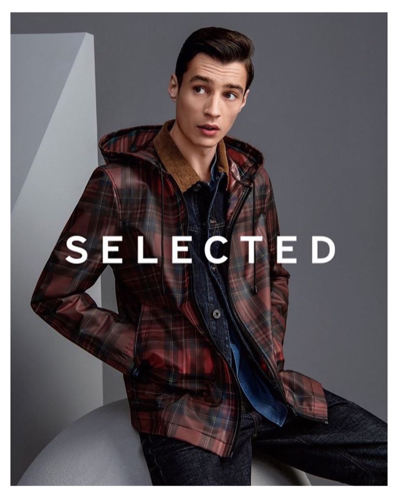 Donning a checked jacket, Adrien Sahores appears in Selected China's fall-winter 2019 campaign.