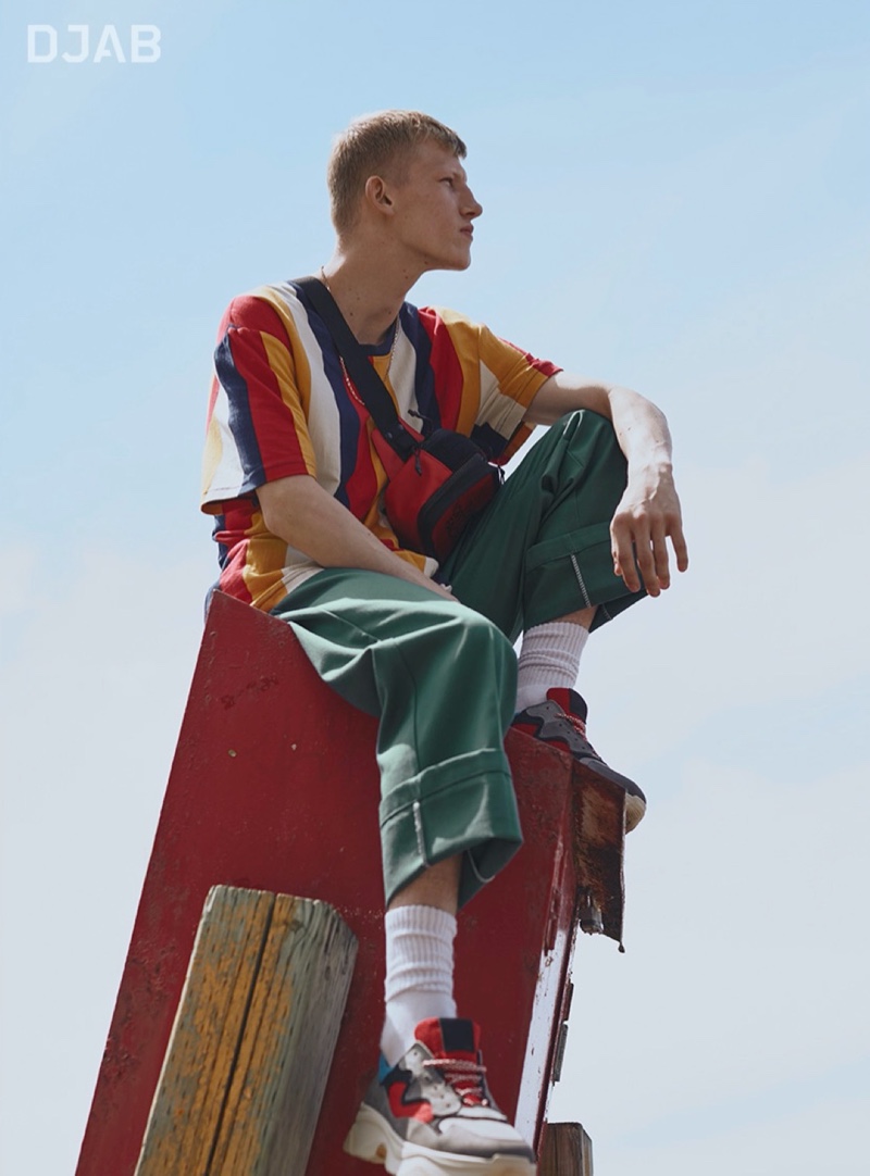 Making a case for color, Connor Newall dons a bold look from DJAB.