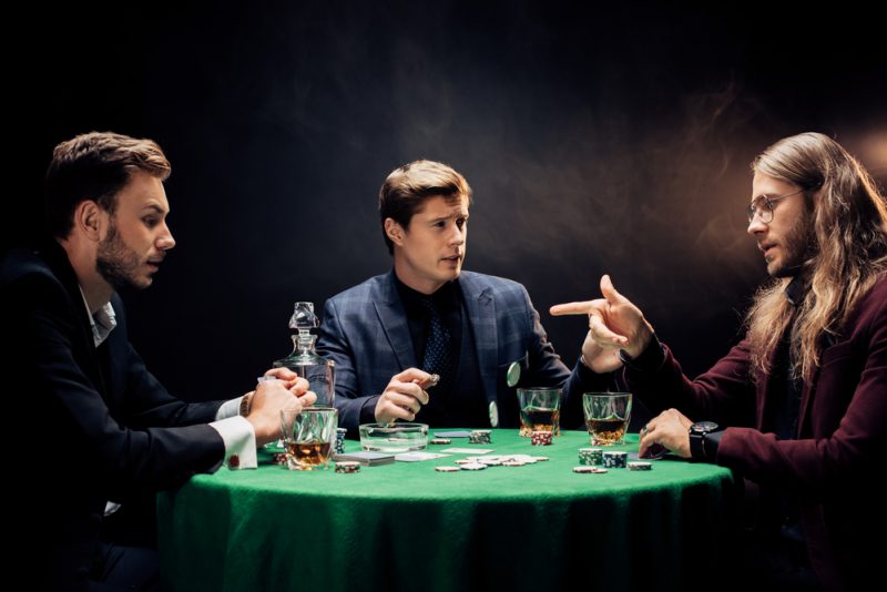 Stylish Men Playing Poker