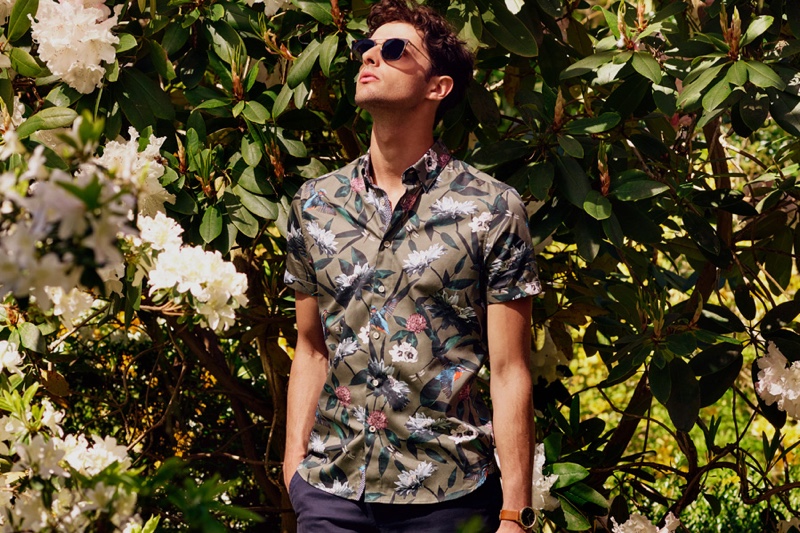 Making a case for tropical prints, Hannes Gobeyn wears a short-sleeve shirt by Ted Baker.