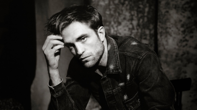 Robert Pattinson sits for a black and white portrait in The Dior Sessions.