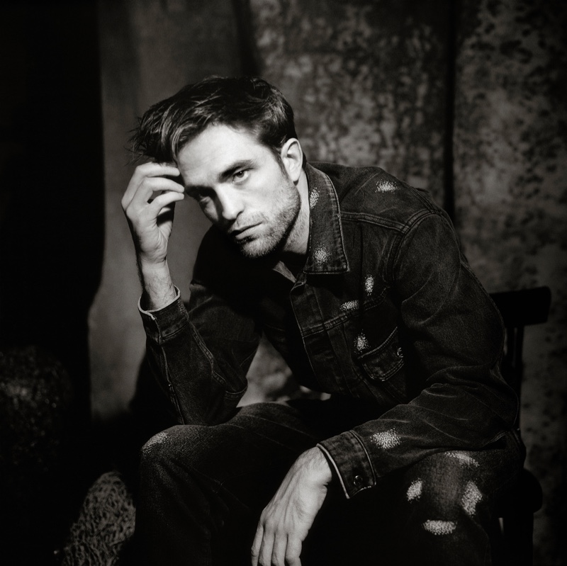 Robert Pattinson sits for a black and white portrait in The Dior Sessions.