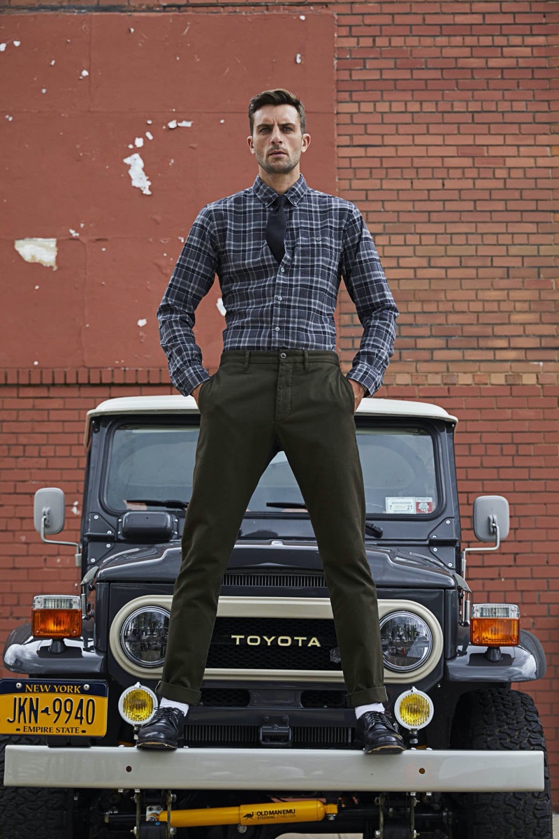 Front and center, Rafael Lazzini sports a Todd Snyder flannel shirt $178 and chinos $228.