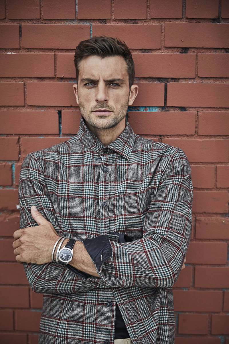 Model Rafael Lazzini wears a Todd Snyder wool glen plaid shirt jacket $298.