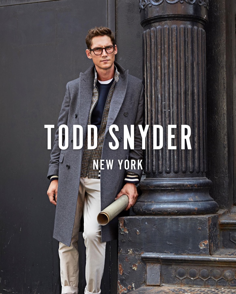 A smart vision, Roch Barbot wears a Todd Snyder Italian cashmere double-breasted topcoat $1,798 and chinos with a Todd Snyder + Golden Bear Harris tweed jacket $998.