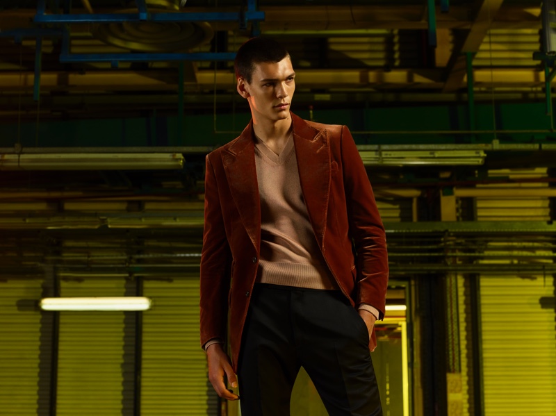 Embracing autumnal tones, Hugh Burry models a look from the Tom Ford x Mr Porter capsule collection.