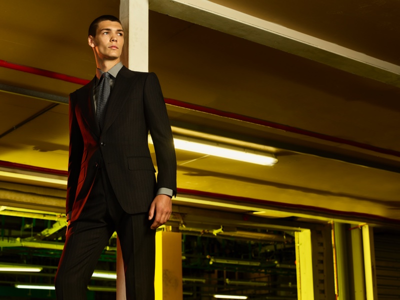 A sharp vision, Hugh Burry sports a tailored suit from the Tom Ford x Mr Porter capsule collection.