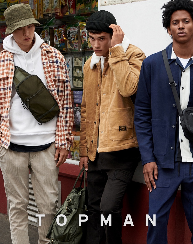 Models Ryu Wankyu, Finn Hayton, and Rafael Mieses front Topman's fall 2019 campaign.