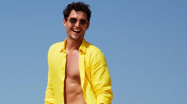 All smiles, Sam Webb dons a yellow linen Vilebrequin shirt $250 with Bateaux Sur L'eau swim trunks $260.
