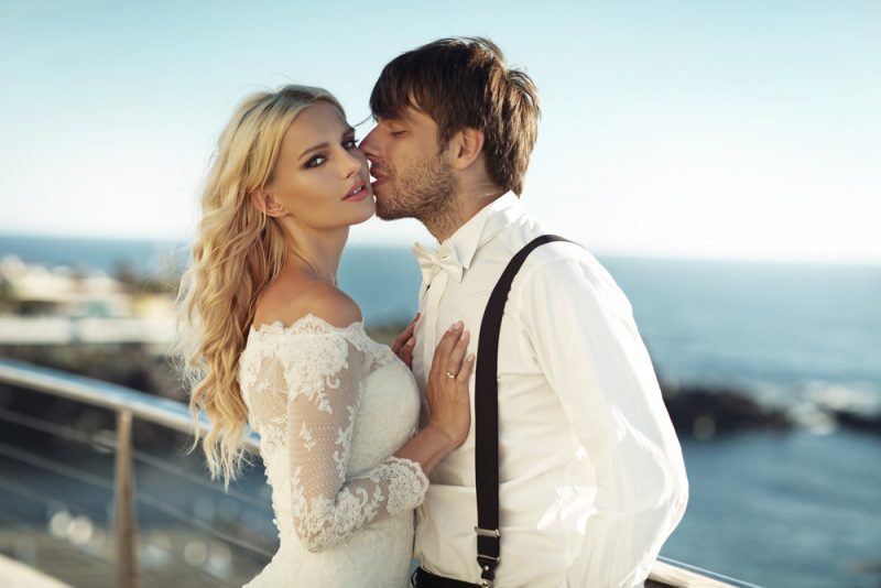 Wedding Couple Groom in Suspenders