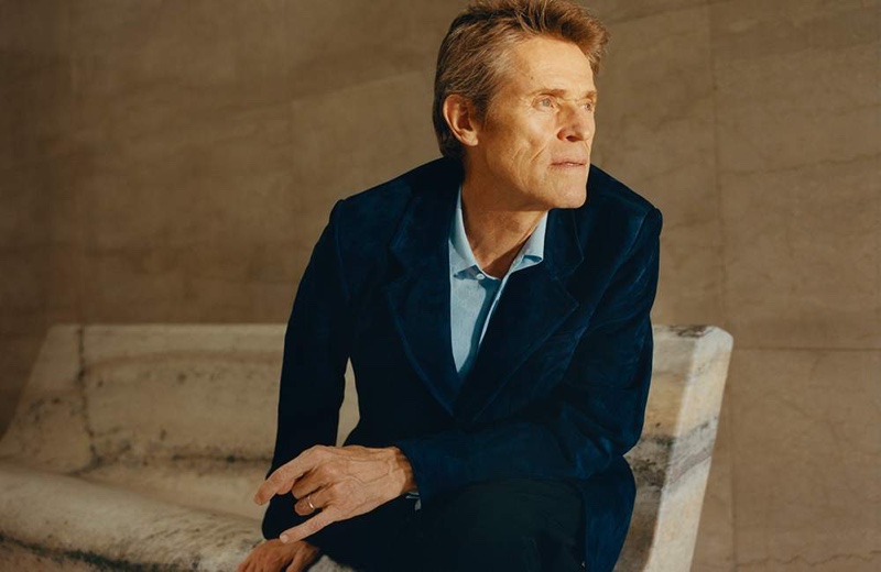 Front and center, Willem Dafoe dons Prada trousers.