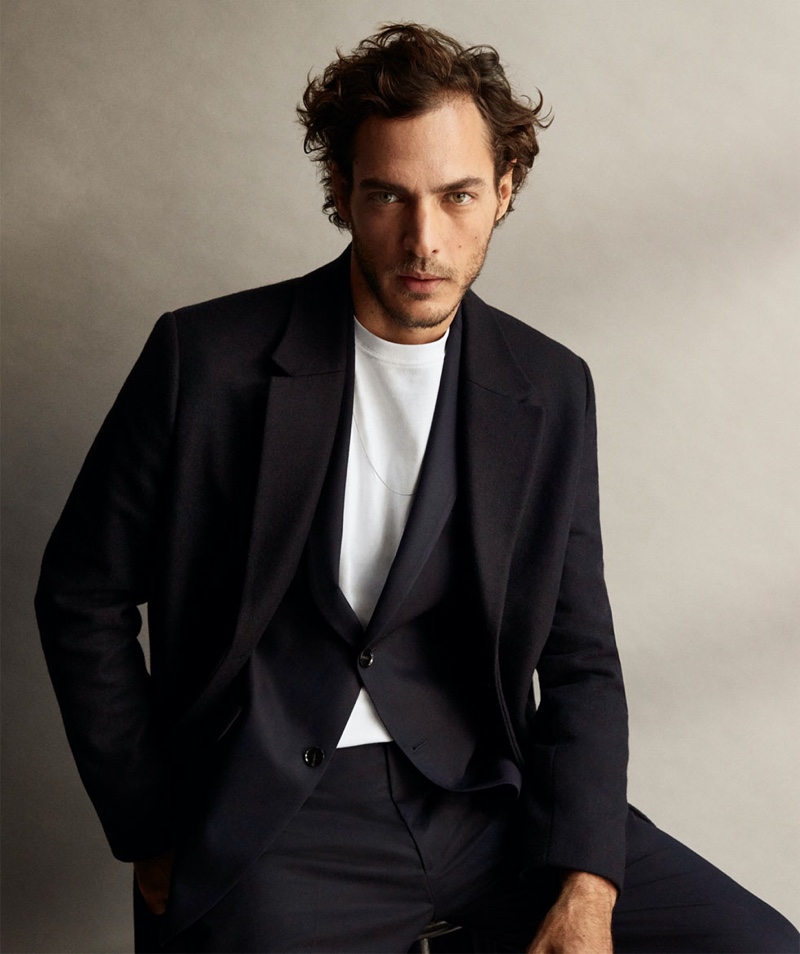 Pierre-Benoit Talbourdet sports a wool coat and suit with a t-shirt from Zara.
