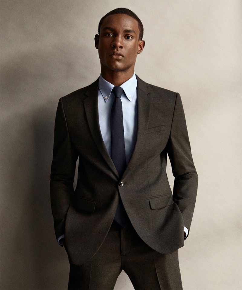 Front and center, Victor Ndigwe dons a wool suit by Zara.