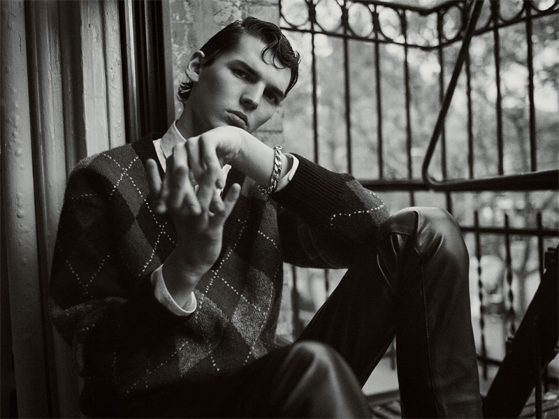 Donning an argyle print sweater with faux leather pants, Eli Epperson appears in Zara's fall-winter 2019 Collection campaign.