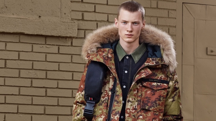 Braien Vaiksaar sports a digital camouflage print parka with denim from Zara SRPLS' fall-winter 2019 collection.