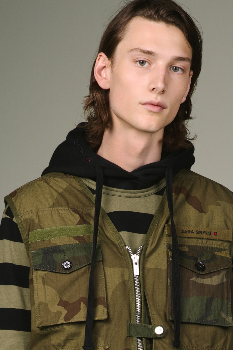 Wellington Grant wears a camouflage look from Zara SRPLS' fall-winter 2019 collection.