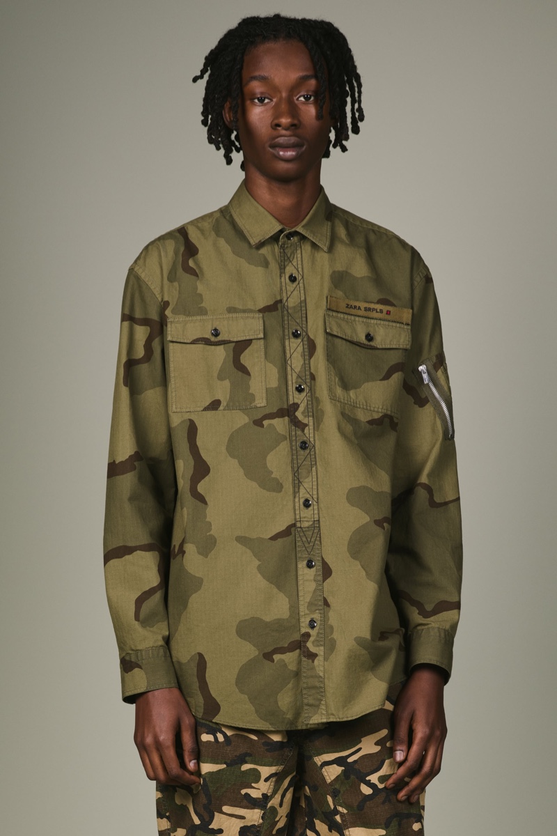 Abdulaye Niang wears a camouflage shirt and pants from Zara SRPLS' fall-winter 2019 collection.