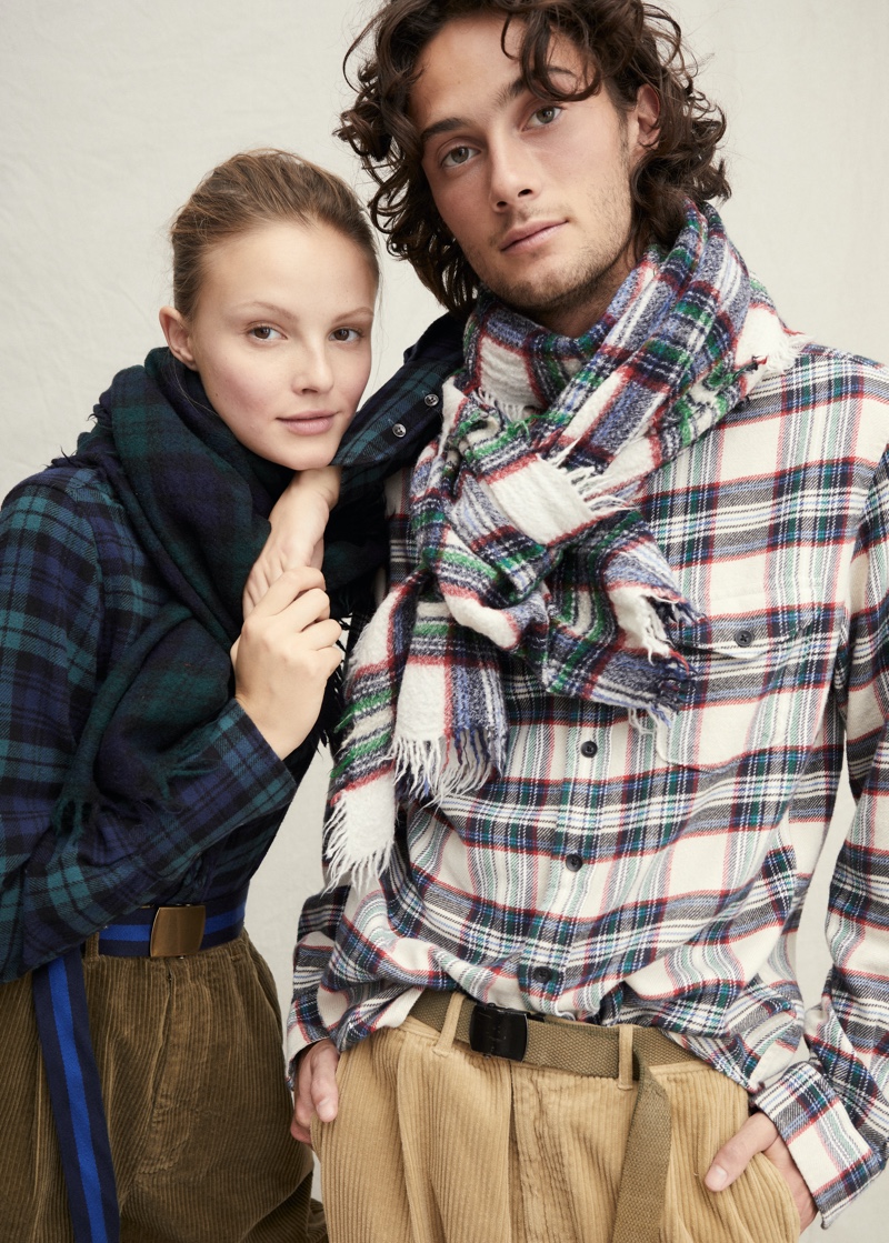 Mad for plaid, Oli Green sports a tartan shirt and scarf with corduroy pants by Alex Mill.