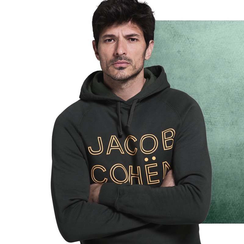Andres Velencoso sports a logo hoodie from Jacob Cohen's fall-winter 2019 collection.