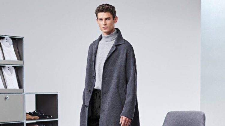 Arthur Gosse dons an oversized gray coat by BOSS.