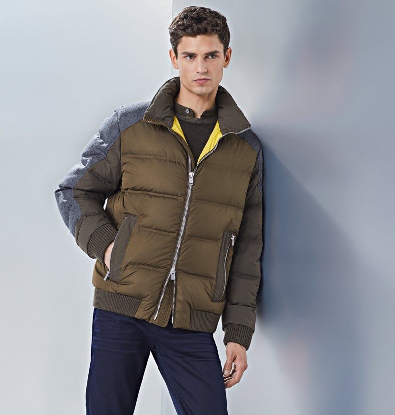 French model Arthur Gosse sports a puffer jacket from BOSS.