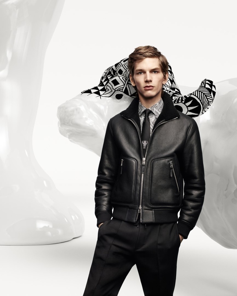 Erik van Gils sports a leather jacket for the BOSS x Meissen holiday campaign.