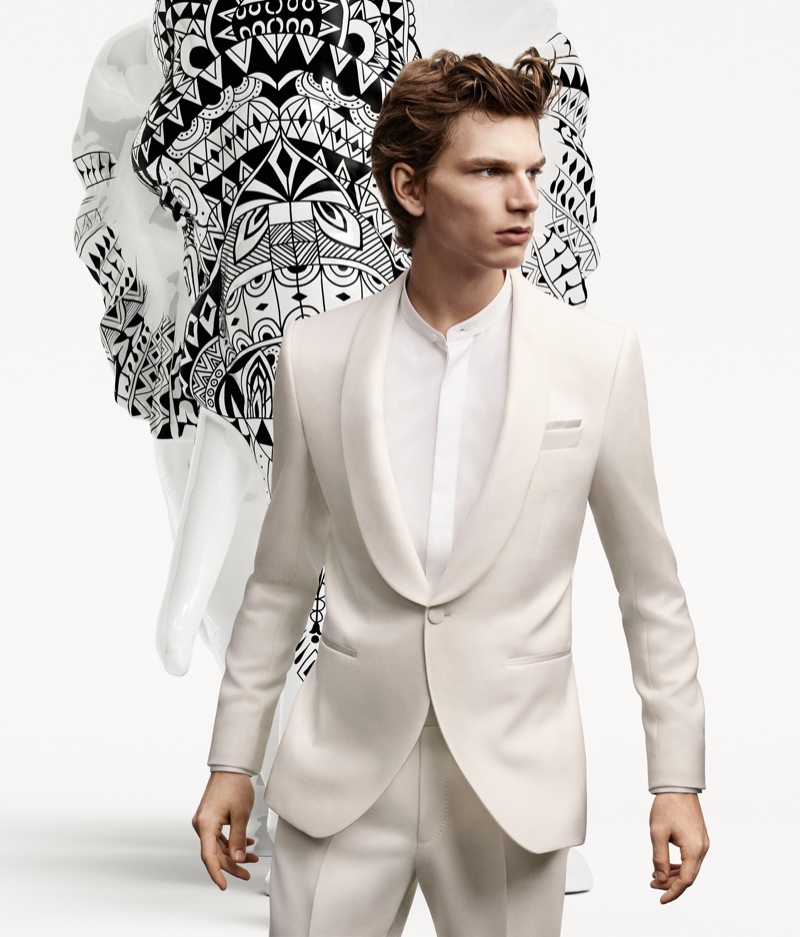 A sharp vision in a white evening look, Erik van GIls fronts the BOSS x Meissen holiday campaign.