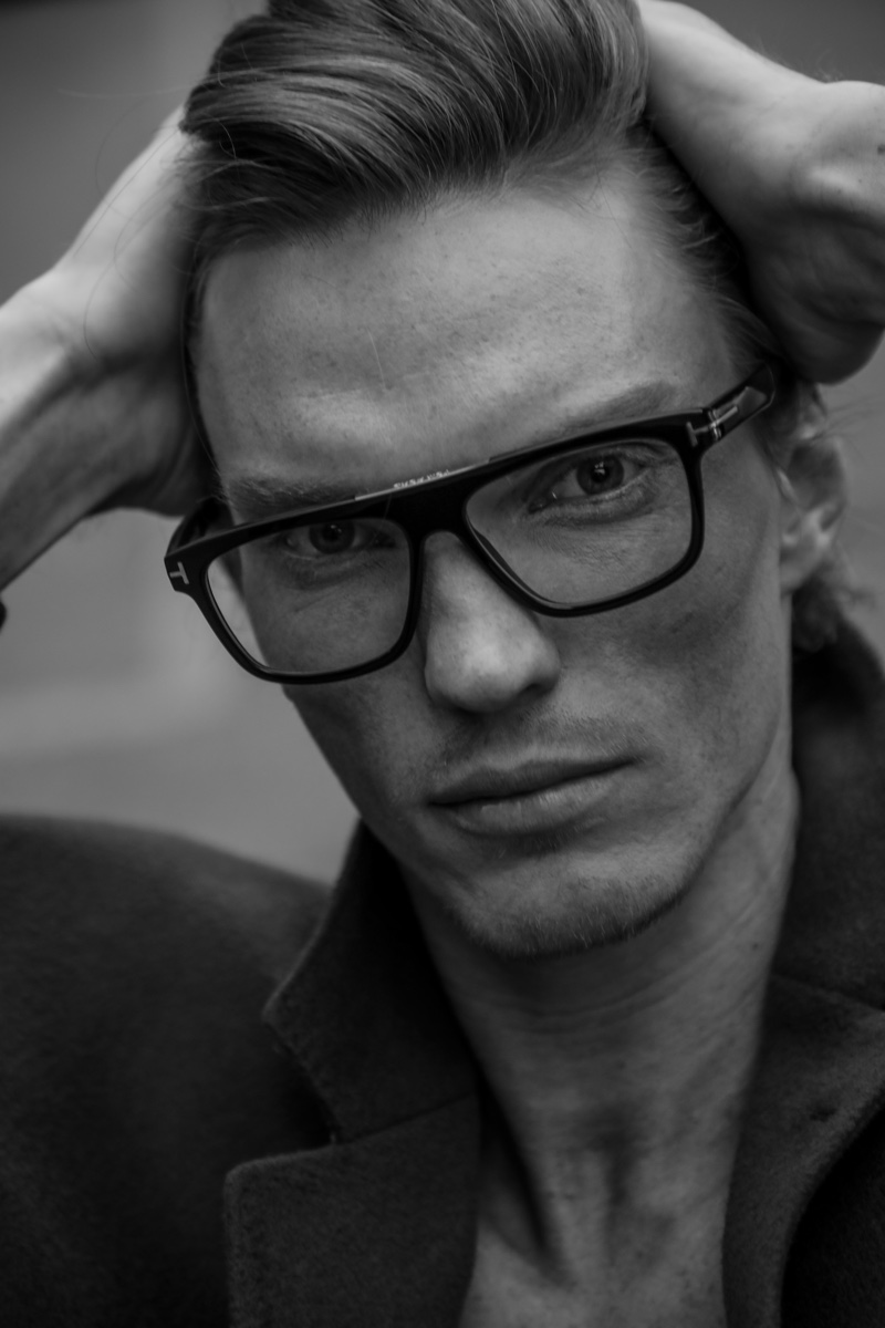 Ready for his close-up, Bruno Novodvorski wears black-framed glasses.