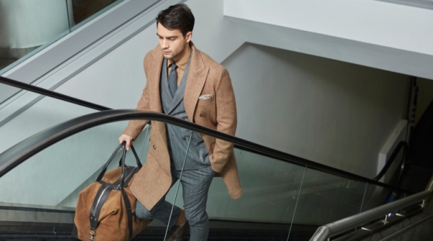 Taking on the role of the traveling man, Aleksandar Rusić stars in Eleventy's fall-winter 2019 campaign.