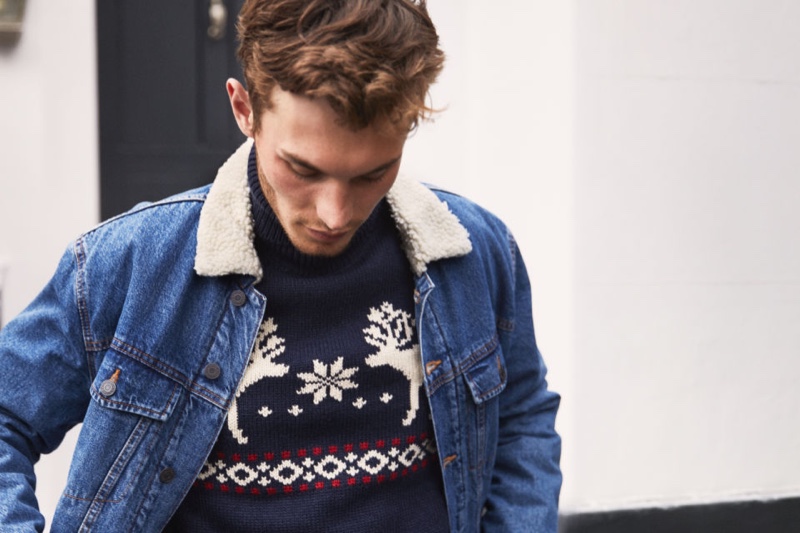 British model Kit Butler wears a jacquard-knit turtleneck sweater with a denim jacket from H&M.