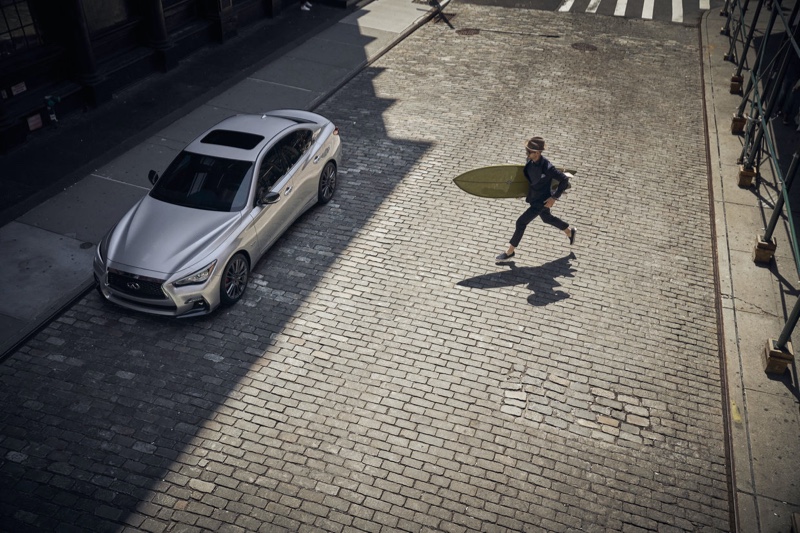 Taking a surfboard in hand, Max Jablonsky fronts Infiniti's campaign.