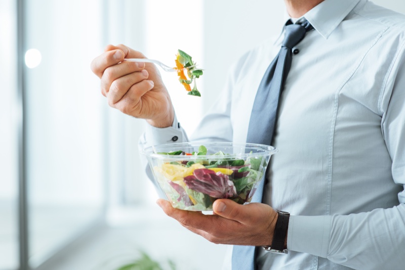 Man Eating Salad