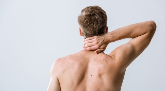 4 Daily Life Challenges for People With Chronic Pain Man Shirtless Back Pain