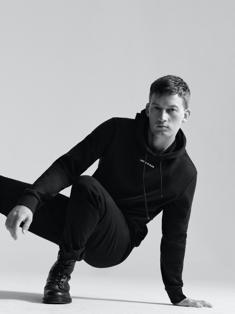 Taking to the studio, Bastian Thiery sports a hoodie from Marc O'Polo's new capsule collection.