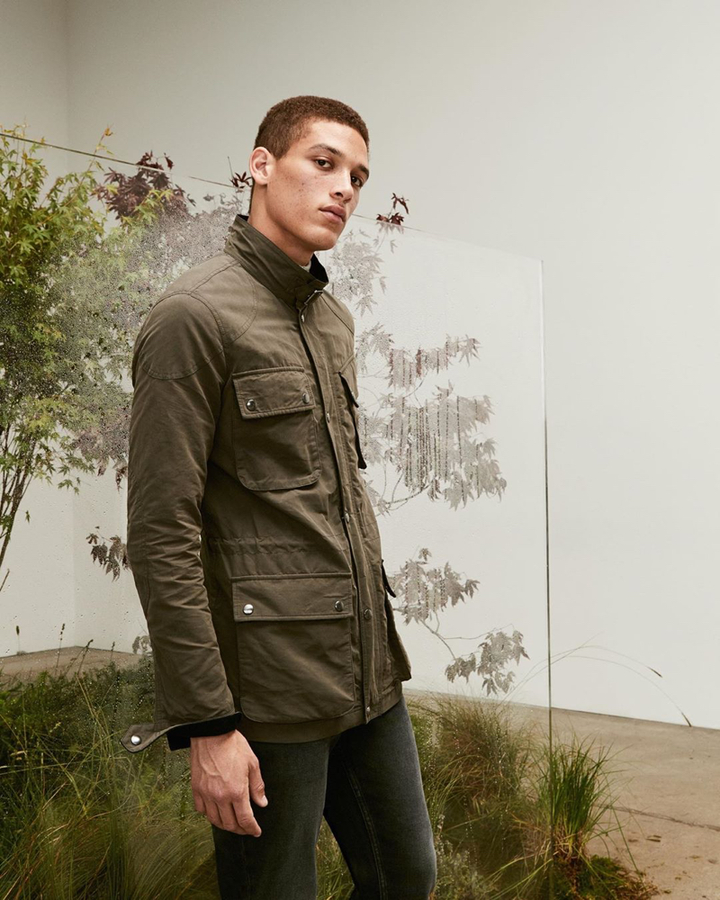 Embracing a rugged look, Marco Pickett sports a jacket from Banana Republic.
