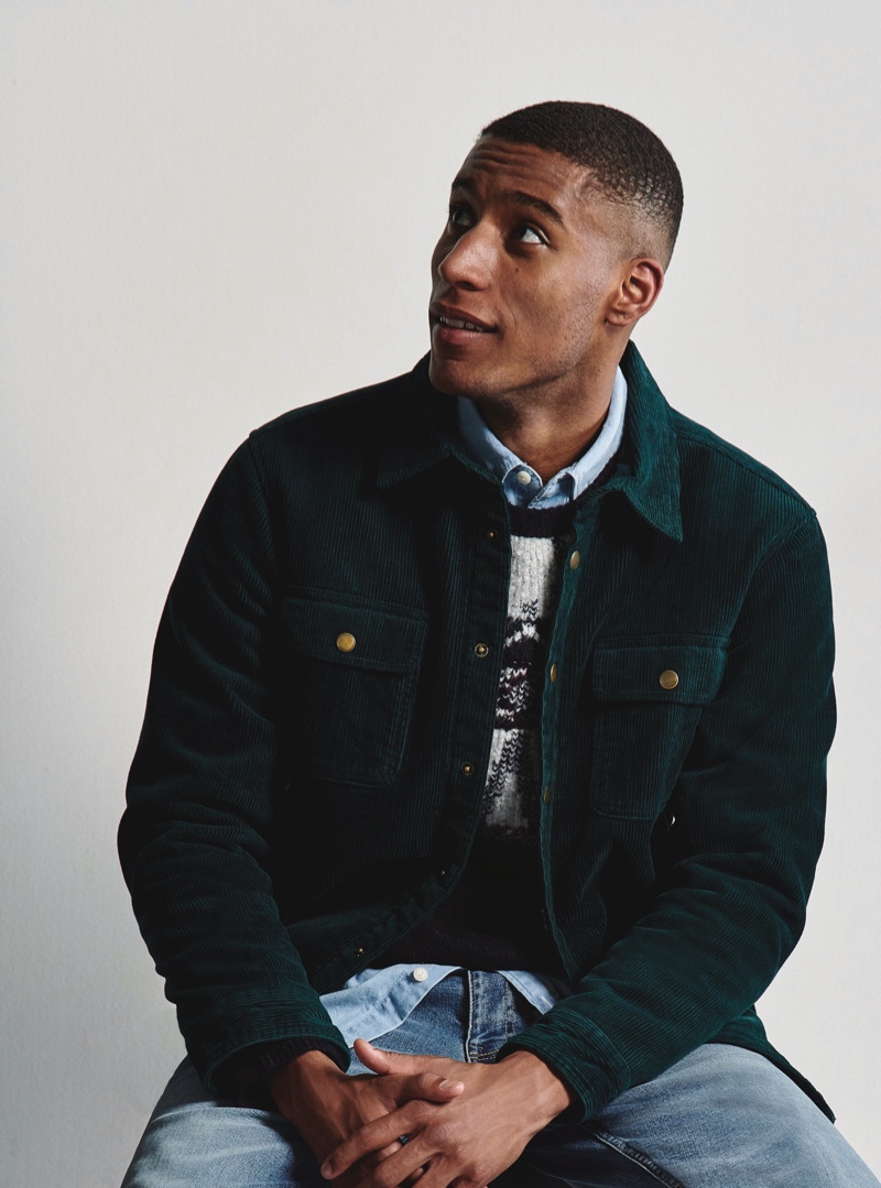 Joshua Payne layers for the season in a corduroy jacket, sweater, and more from Marks & Spencer.